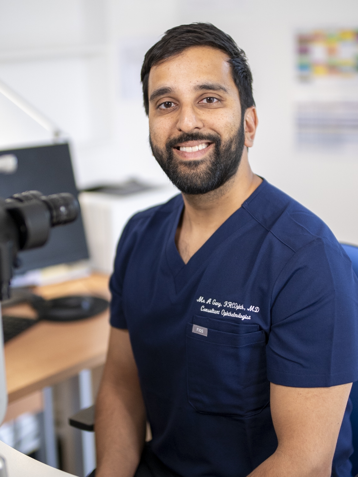 Mr Garg in clinic beside the slit lamp